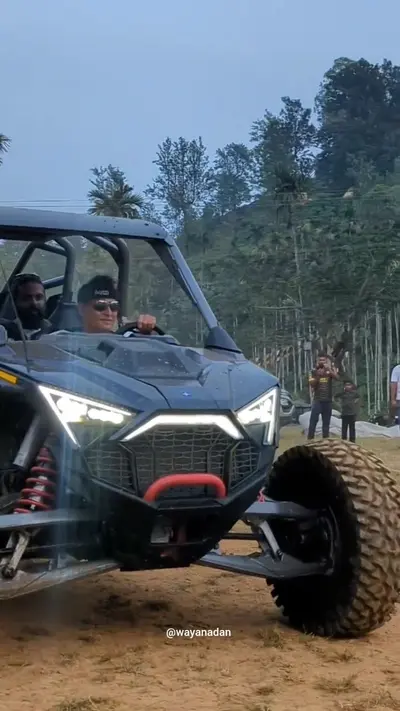 Off-Road Buggy Ride with Boche Boche driving a powerful all-terrain buggy vehicle at boCHE 1000 Acre, one of the best resorts in Wayanad for outdoor thrill-seekers.