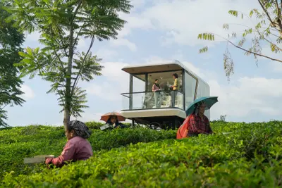 Futuristic xpod wayanad villa exterior with glass front at boCHE 1000 Acres resort in wayanad