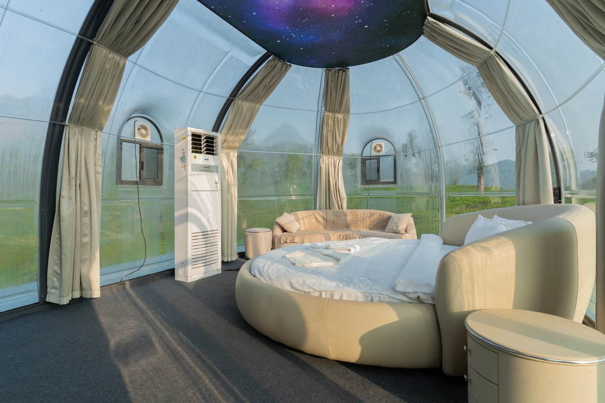 Dome Room with Panoramic Windows Elegantly decorated dome room with panoramic window views, perfect for wayanad resort booking