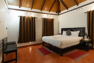 Comfortable guest rooms at wayanad inside the Mountain Residence villa