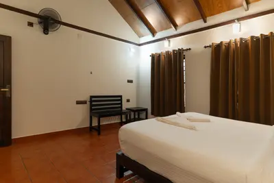 Comfortable guest rooms at wayanad inside the Mountain Residence villa