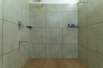 Deluxe bathroom with modern fittings at Mountain Residence,boche 1000 acre a luxury resort in Wayanad Kerala
