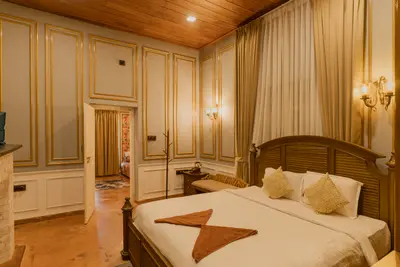 Luxurious master bedroom interior inside british bungalow wayanad heritage stay