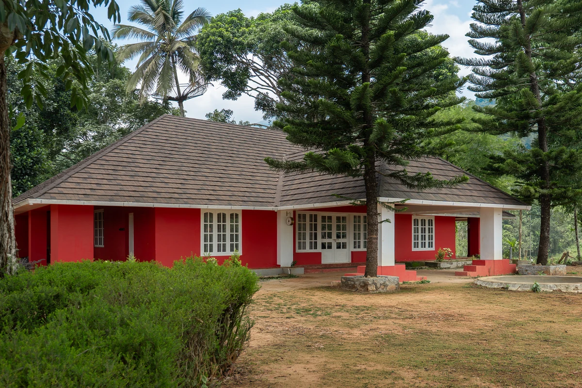 British Bungalow Tea Plantation View Wide angle view of british bungalow wayanad surrounded by tea plantation resort wayanad